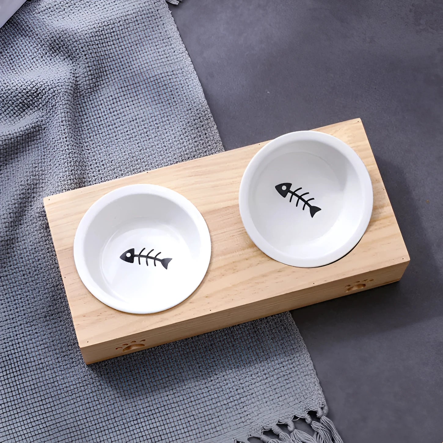 Solid wood pet dining table with stainless steel bowls in elevated design for dogs and cats