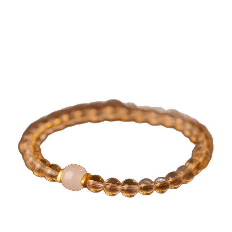 Handmade unisex bracelet with authentic Brazilian rutilated quartz and pearl elements, in green or white jade.
