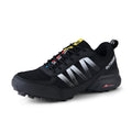 Mountaineering hiking sneaker in black colour with lace-up front and rubber sole