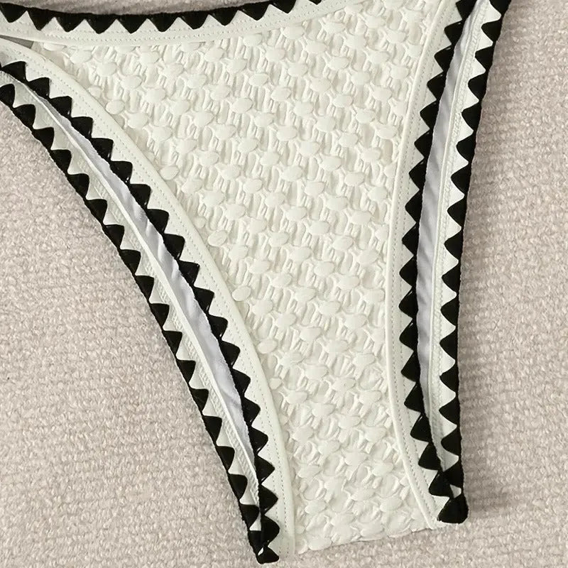 Women's split bikini swimsuit in briefs style available in white or blue colours