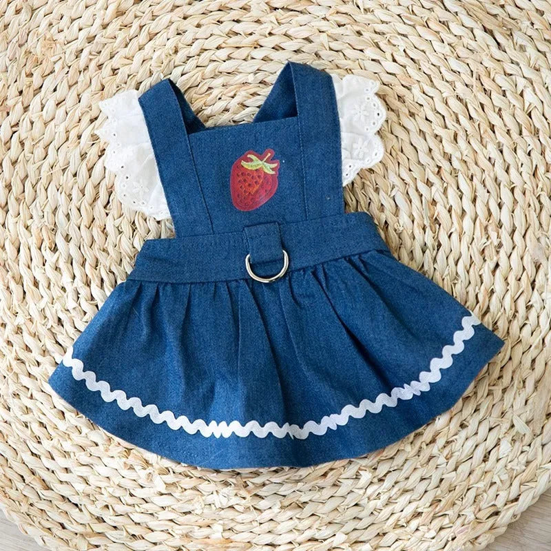 Strawberry print denim dog skirt with traction dots on Bondi Blue background
