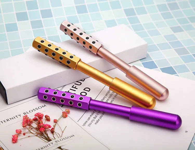 Purple germanium particle facial massage roller with 193mm handle length for beauty skincare