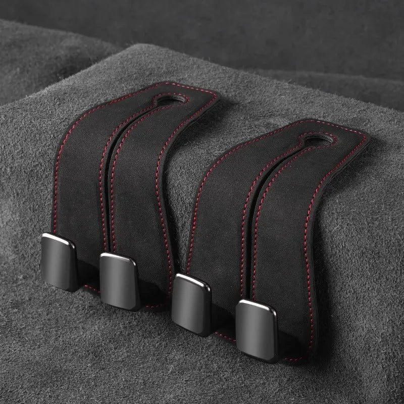 Alloy metal car seat gap storage hook with suede lining in black colour, shown flipped open.