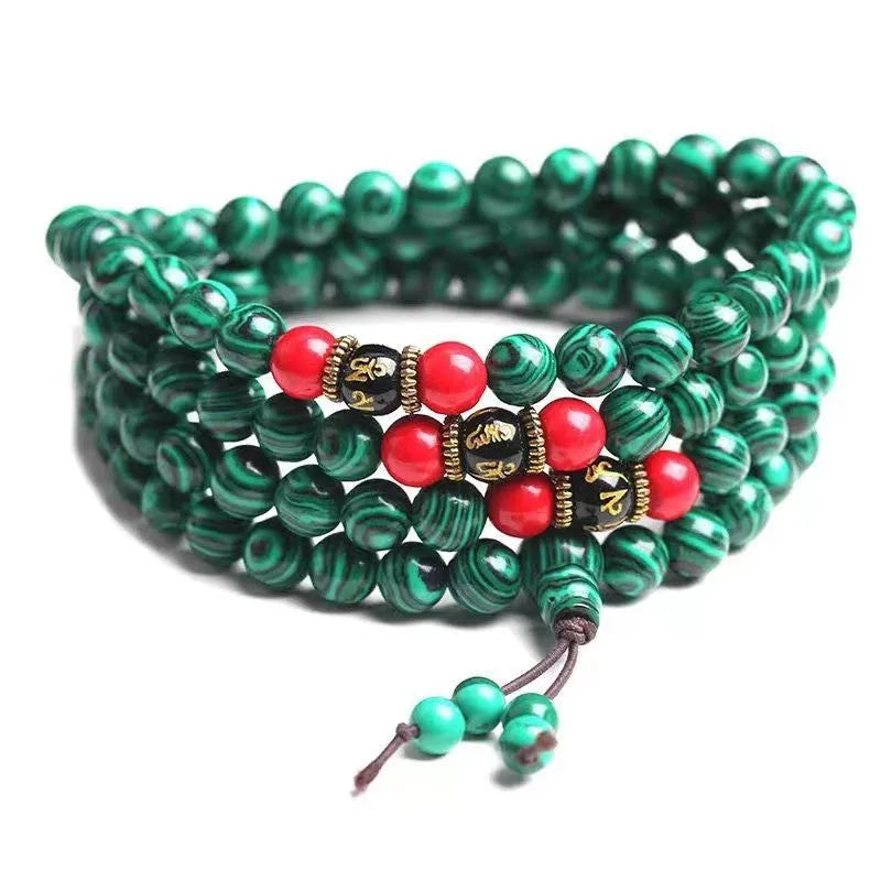 Turquoise Tibetan bracelet with 108 polished synthetic stone powder beads in traditional mala configuration