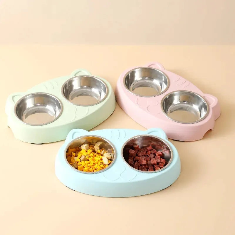 Macaron coloured plastic pet feeder tray with two bowls and a non-slip base.