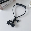 Universal plastic cell phone neck hanging bracket in black with horizontal and vertical clip, extension, and anti-slip cushion