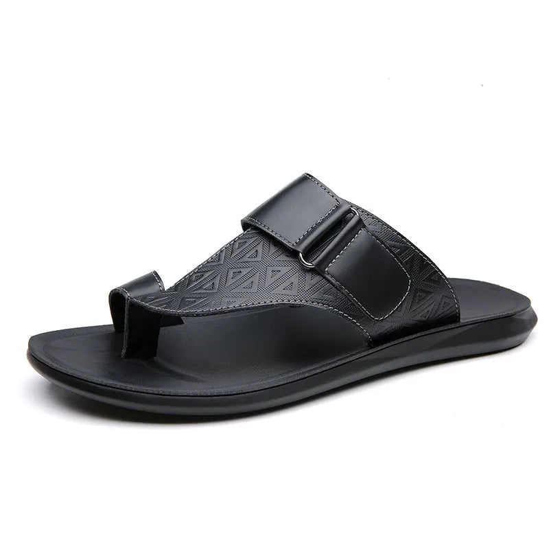 Men's simple beach slippers in light brown cowhide with a rubber sole, shown from the side.