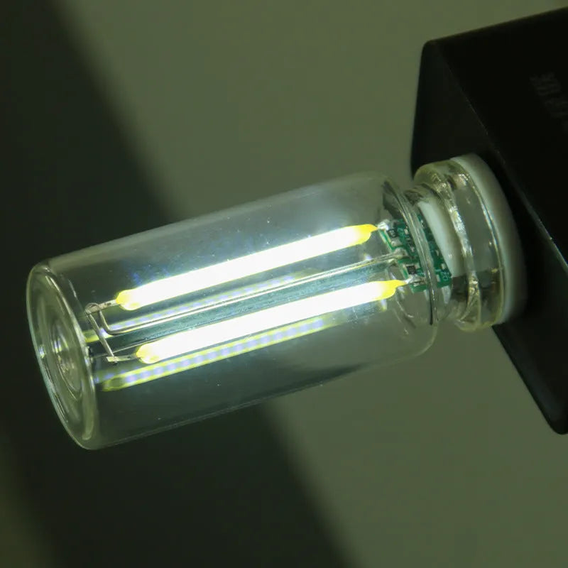 Small transparent glass USB touch night lamp in modern minimalist style.