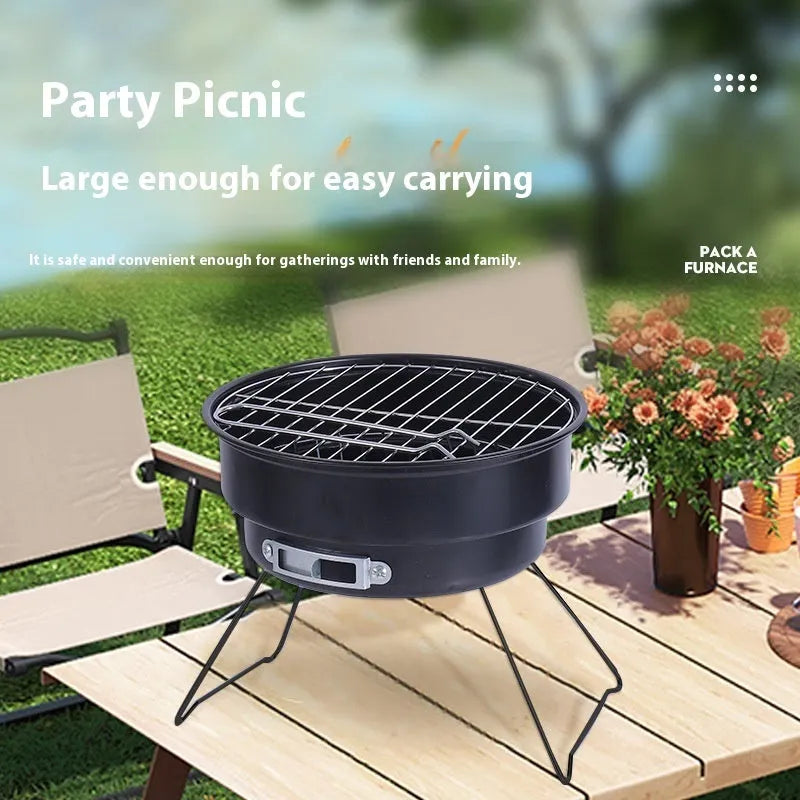 Small folding round metal ice stove with grill mesh, leg, and storage bag for portable barbecues.