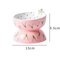 Ceramic raised cat bowl with tilted design in orange colour, showing slip-resistant base and elevated feeding height