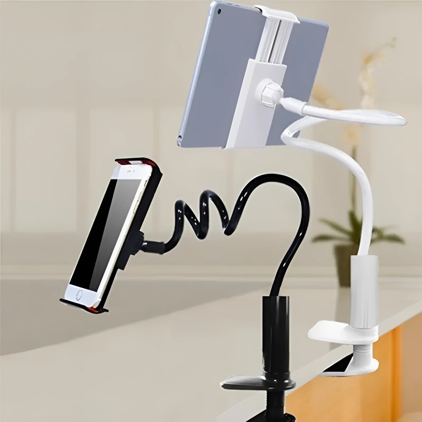 Black and white flexible mount holder with adjustable clamp and suction cup base holding a tablet