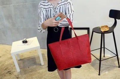 Simple European fashion shoulder bag with adjustable strap in black or grey colour
