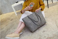 Simple European fashion shoulder bag with adjustable strap in black or grey colour