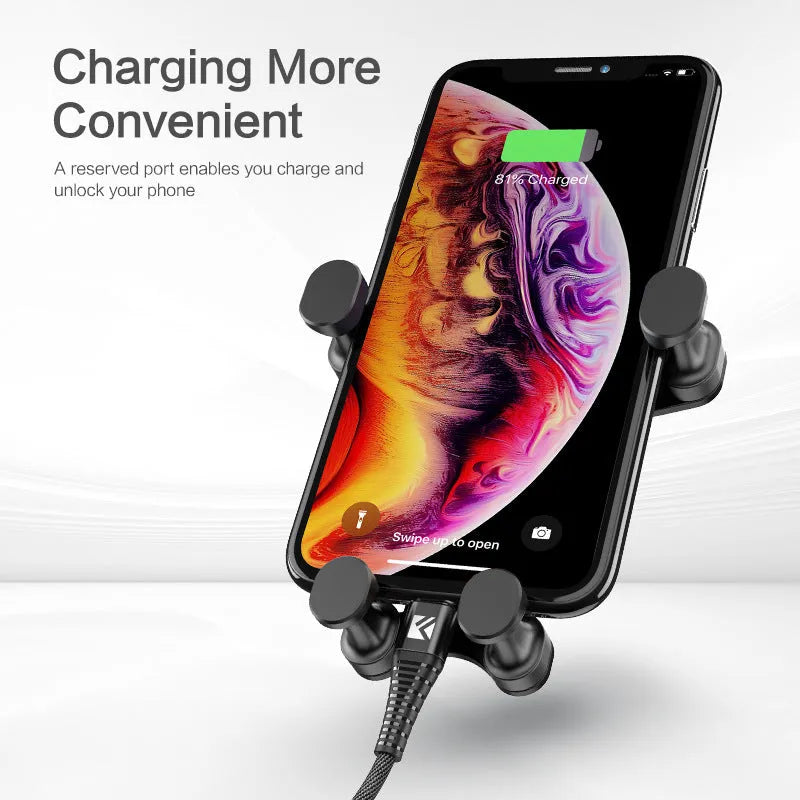 Black gravity car phone holder mounted on car vent with smartphone secured in 360-degree rotating cradle