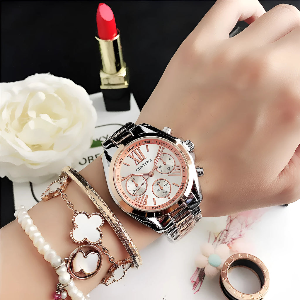 Women's silver rose gold diamond quartz watch with mesh strap, 15mm thick case.