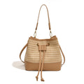 Woven straw women's crossbody bucket bag in horizontal square shape with adjustable shoulder strap