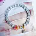 White Chinese-style opal flower beaded bracelet with glass and coloured glaze components