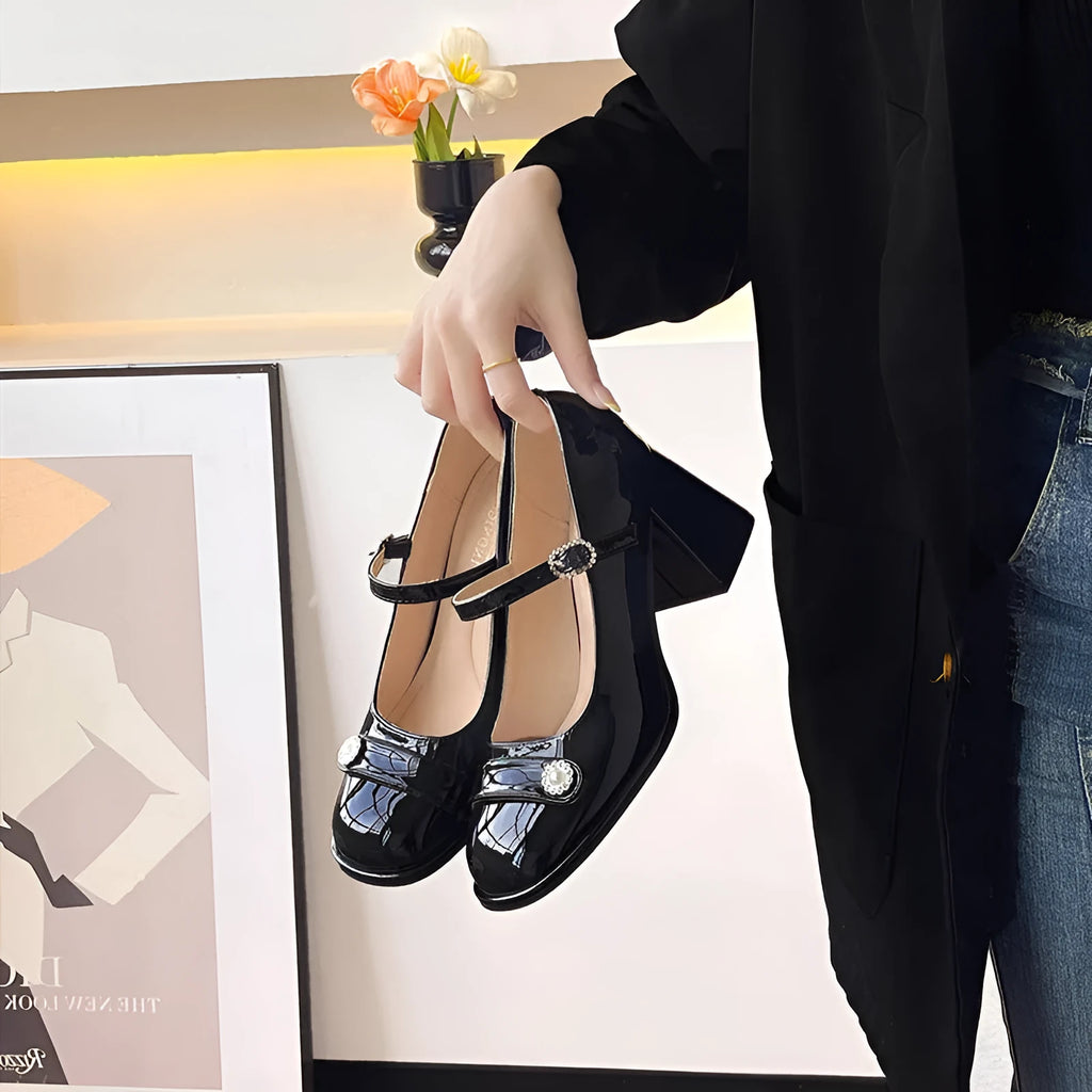 Apricot patent leather women's shoes with chunky heel, round toe, and buckle fastening.