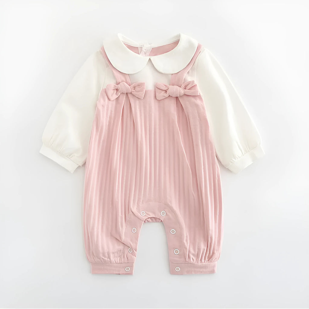 Pink 100% cotton embroidered jumpsuit for a baby girl, with long sleeves and single-breasted closure.