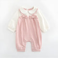 Pink 100% cotton embroidered jumpsuit for a baby girl, with long sleeves and single-breasted closure.