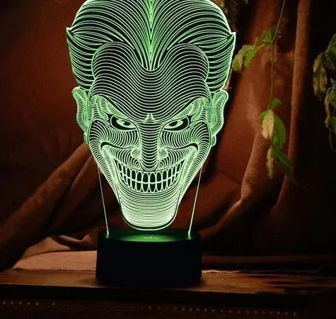USB-powered 3D LED lamp showing multiple colours on an acrylic panel with a remote control.