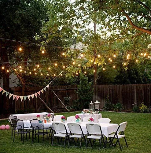 Waterproof solar powered LED string lights with PVC shell in a garden setting
