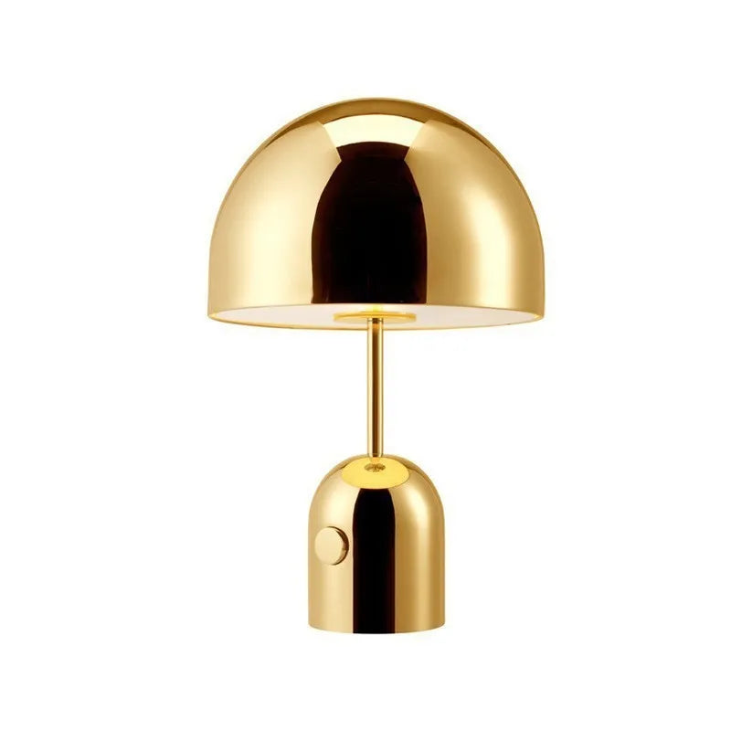 Mushroom-shaped table lamp with metal base in chrome, gold, or rose gold finish on wooden table