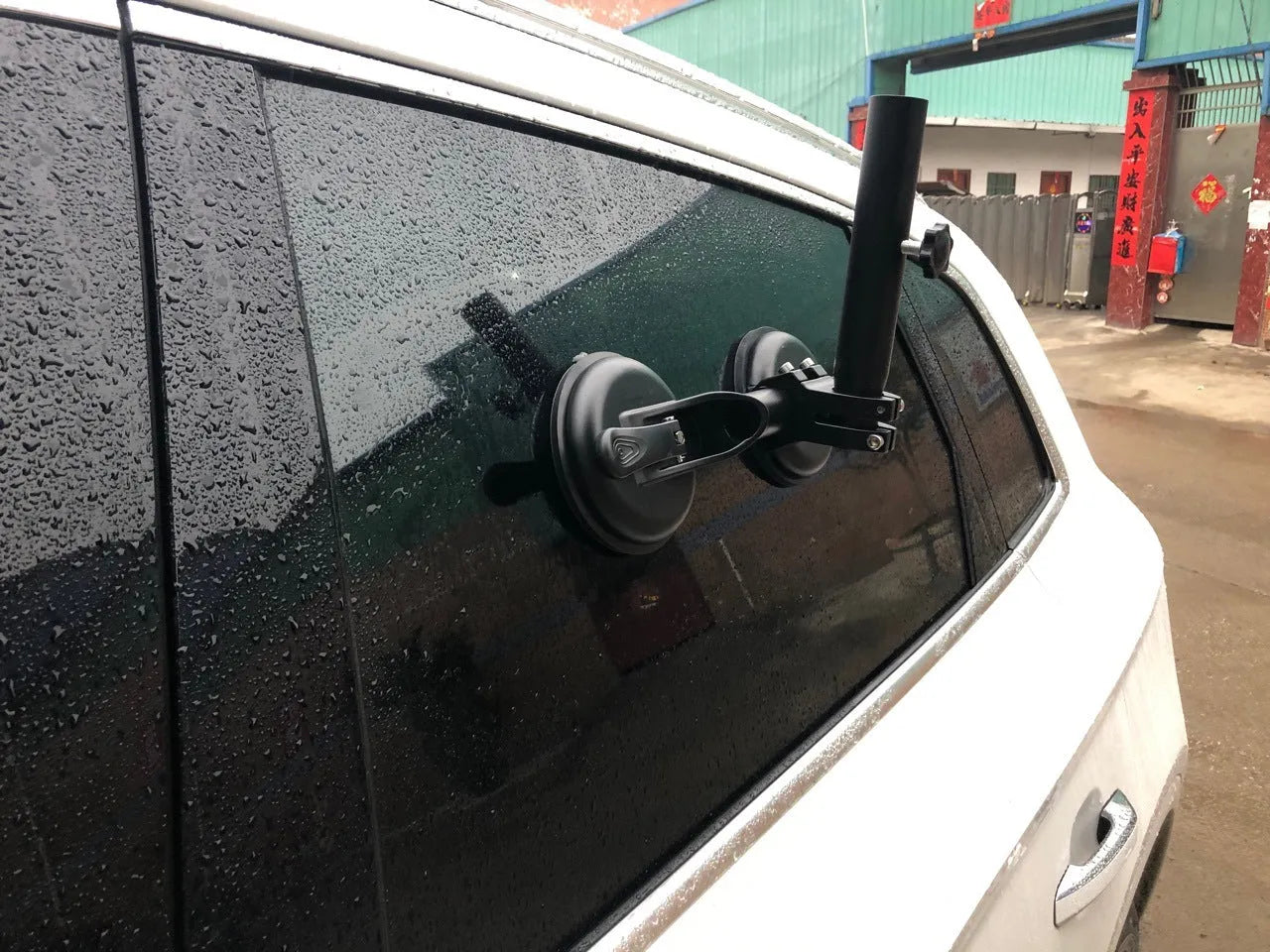 Black off-road car sucker base with round rubber suction cup for mounting on vehicle windows.