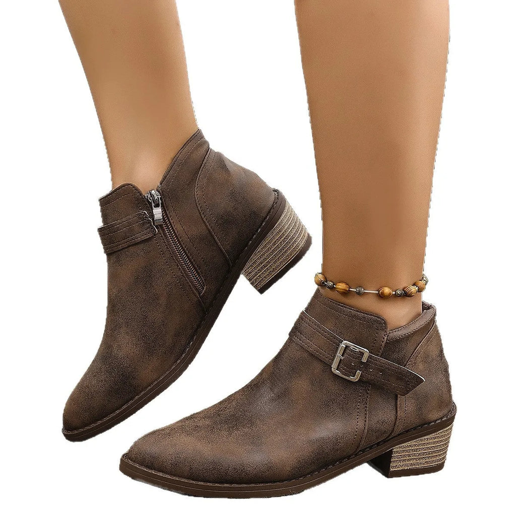 Autumn pointed female boots with chunky heel and belt buckle detail in black