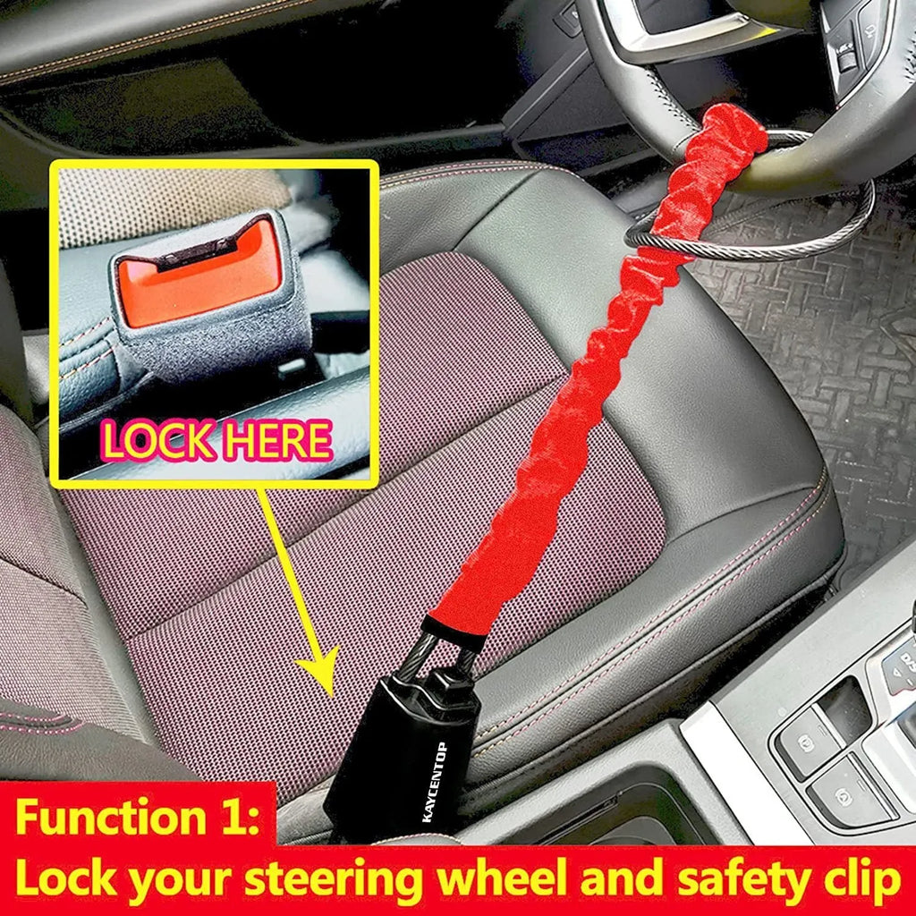 Red car steering wheel lock with steel cable secured on a steering wheel.