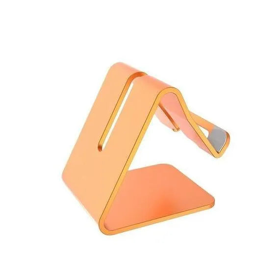 Aluminium alloy foldable tablet stand in gold holding a smartphone on a desk