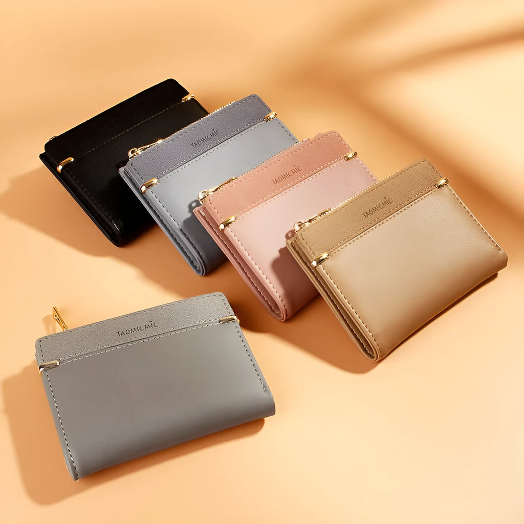 Compact black ladies wallet with zipper closure showing multiple internal card slots and compartments