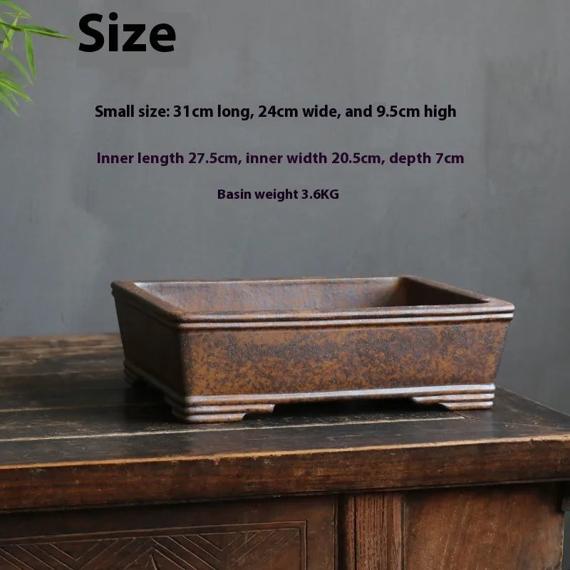 A rectangular purple sand bonsai pot with a linear firewood burning pattern, shown in two sizes.