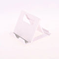 Folding mobile phone and tablet bracket in black, 83 x 71 x 7 mm, made from ABS and silicone