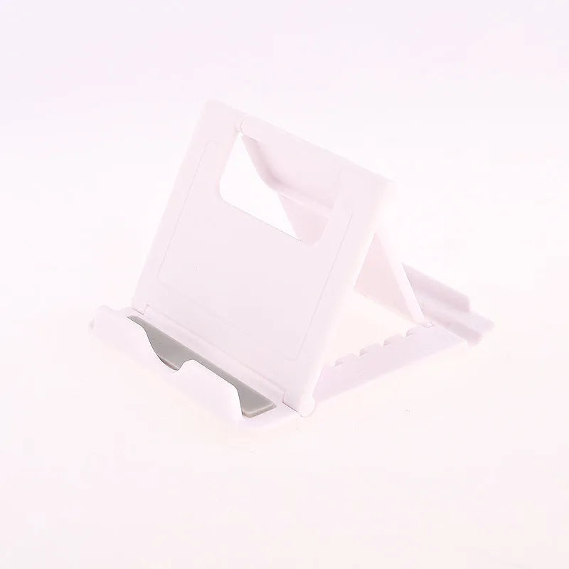 Folding mobile phone and tablet bracket in black, 83 x 71 x 7 mm, made from ABS and silicone