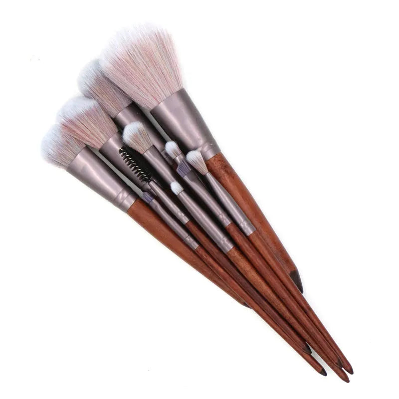 11-piece makeup brush set with synthetic hair heads, matte coffee aluminium ferrules, and natural wood handles