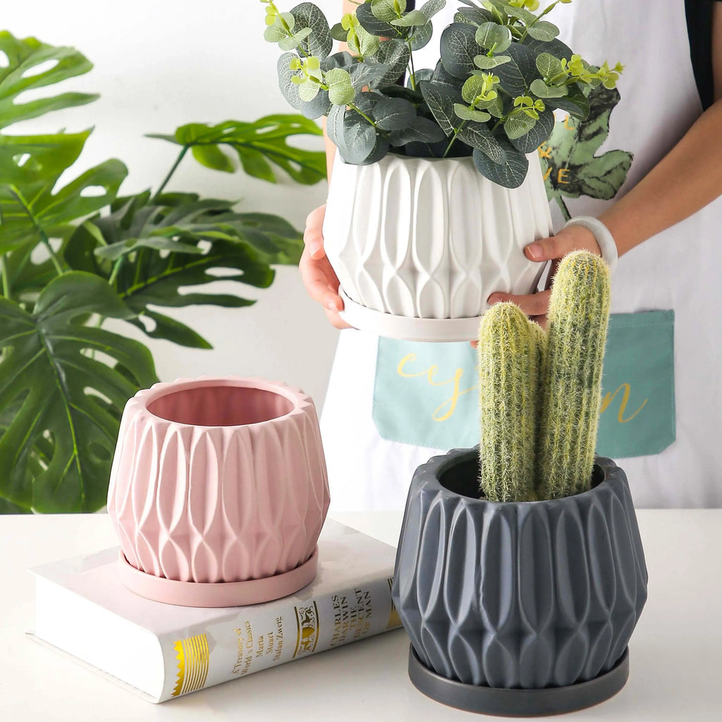 Grey ceramic medium flowerpot for desktop or floor plant display with simple styling