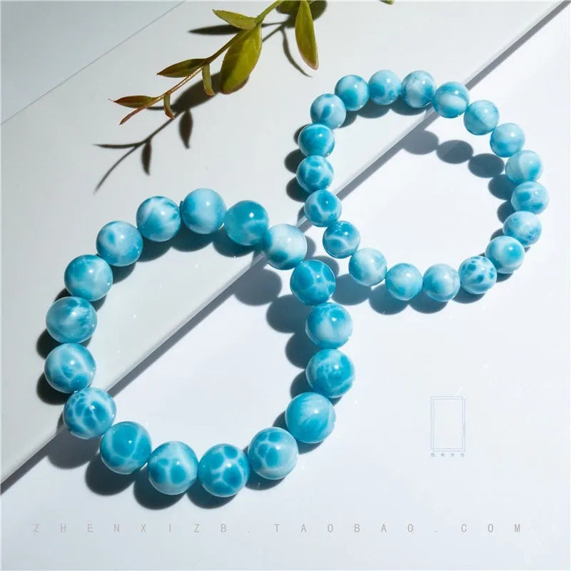 Blue bodhi bracelet with natural crystal sea-pattern stone centrepiece and pearl details in Maillard style