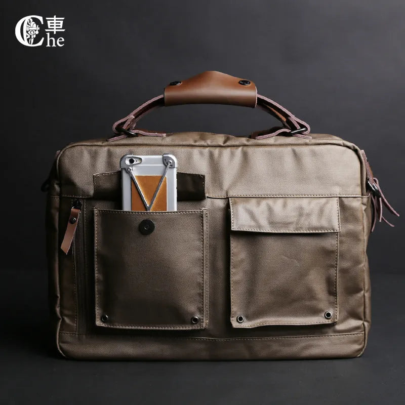 Dpark black single shoulder sling laptop bag for 14 or 15 inch devices on a table