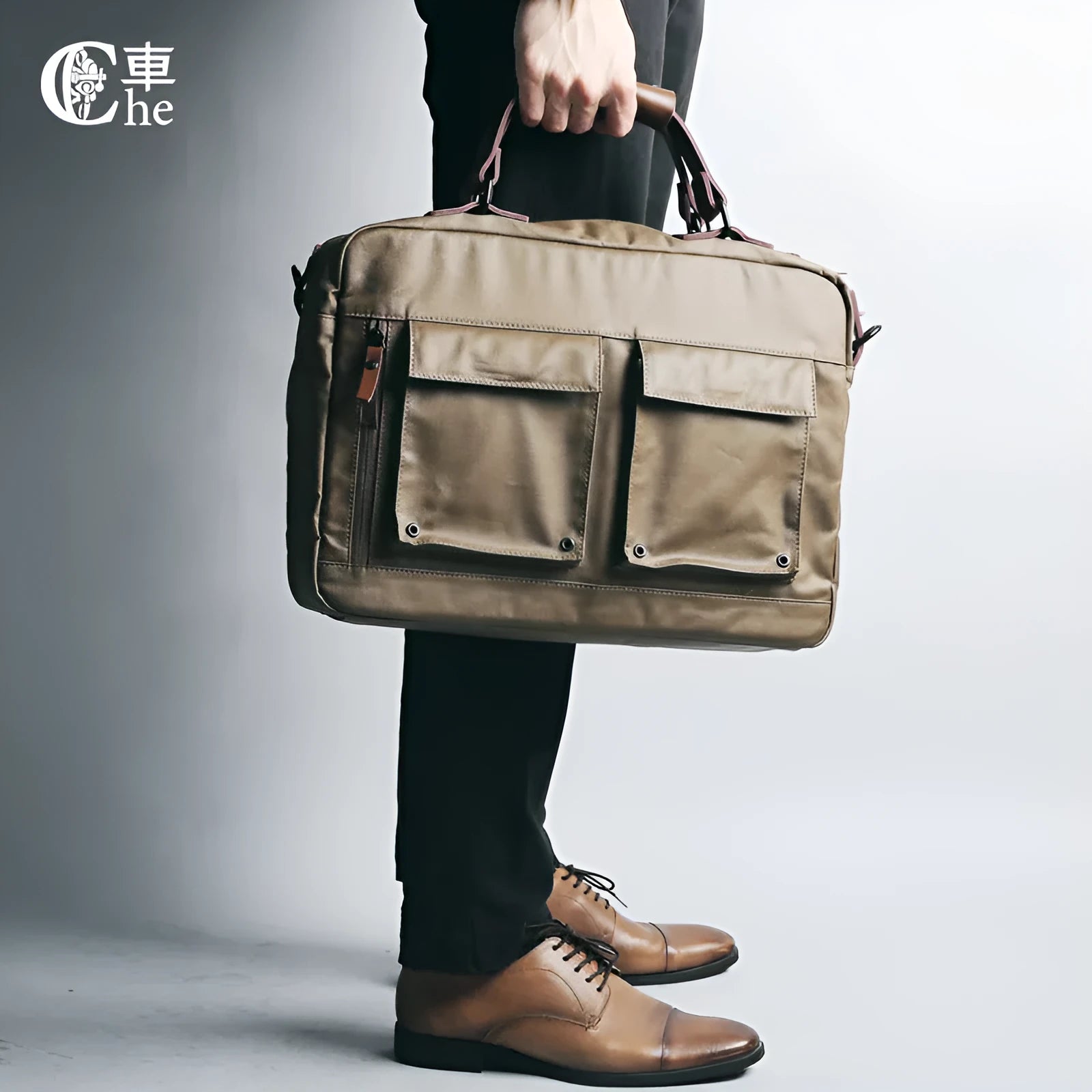 Dpark black single shoulder sling laptop bag for 14 or 15 inch devices on a table
