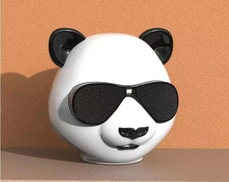 Classic style portable mini Bluetooth speaker showing front grill and likely control buttons.