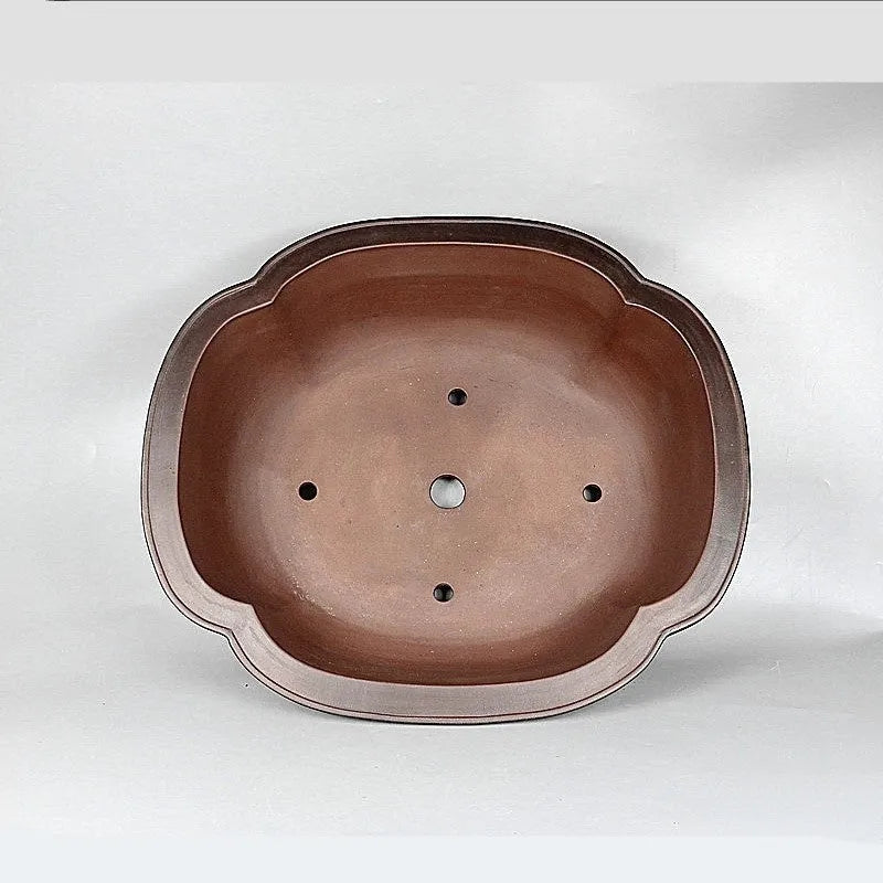 Handmade antique purple clay flowerpot in a crabapple shape, 74cm long.