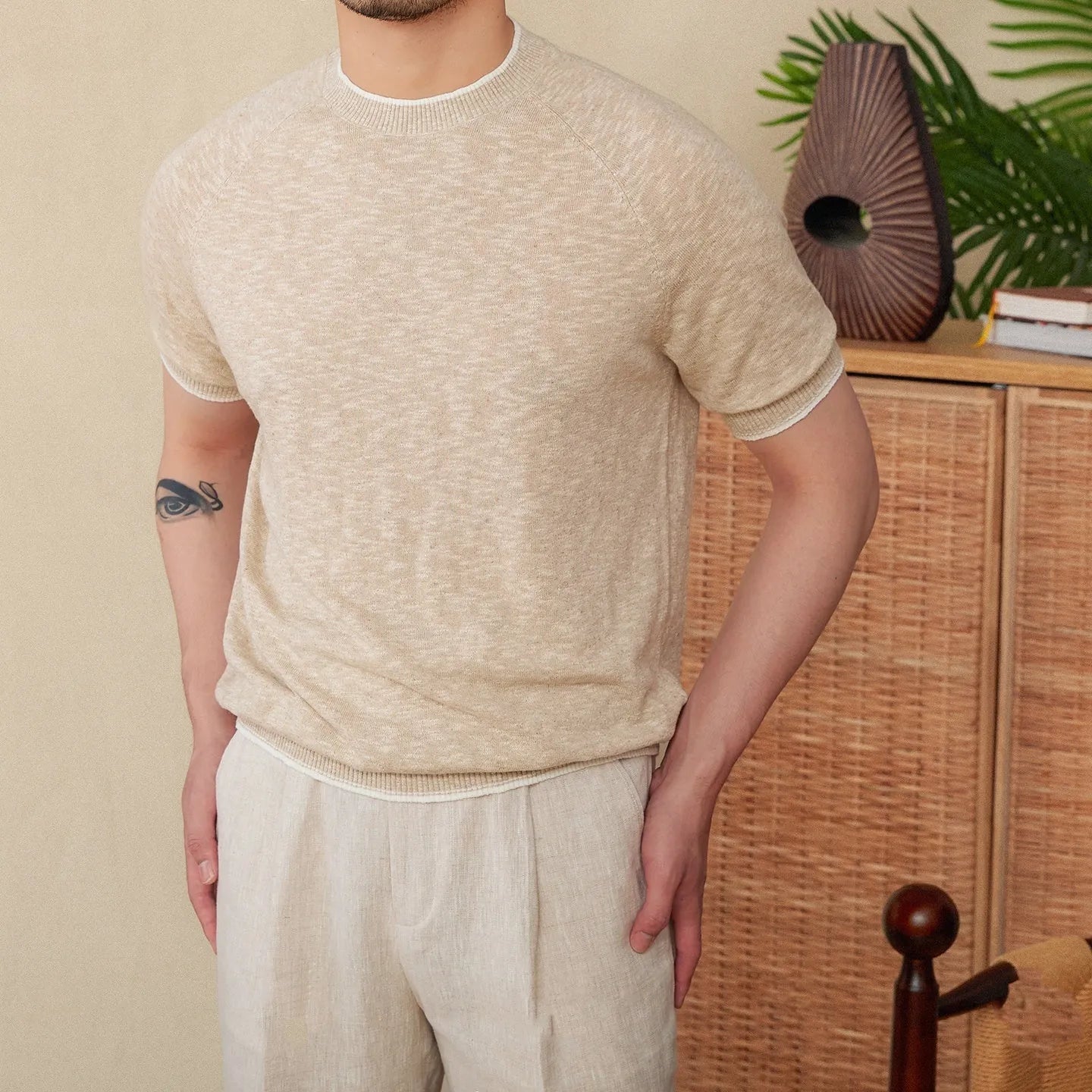 Brown linen cotton casual t-shirt with round neck and short sleeves laid flat