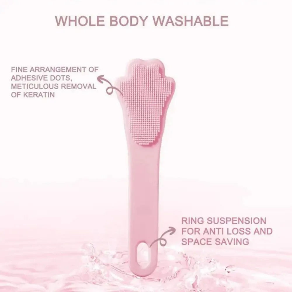 Pink silicone finger toothbrush for dogs and cats with soft nubby bristles.