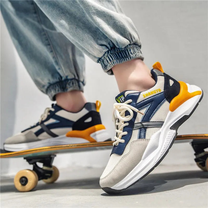 Men's low-top breathable running sneaker with mesh upper, orange and yellow options, injection moulded sole
