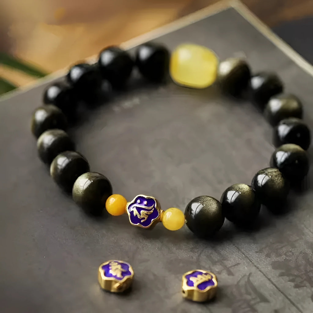 Natural golden obsidian bracelet with geometric zodiac charm bead showing chicken zodiac design