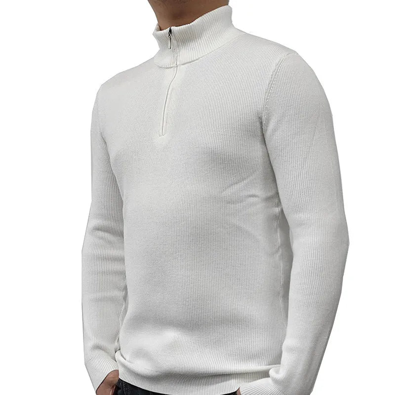 Man wearing a grey half turtleneck zip-front sweater, a casual cotton blend pullover.