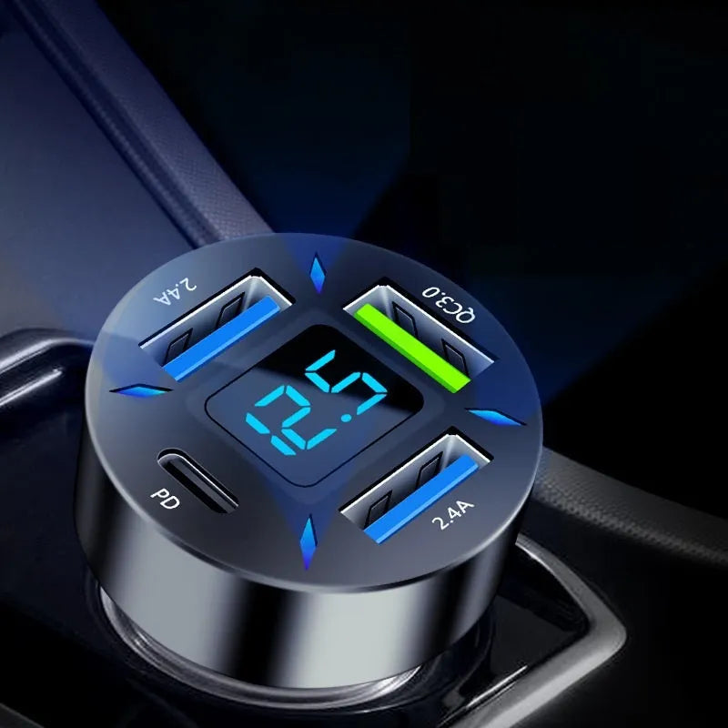 Four-port USB car charger with digital display showing output, compact black design