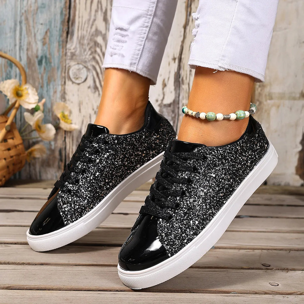 Women's plus size sequinned front lace-up board shoes in black, flat rubber sole.