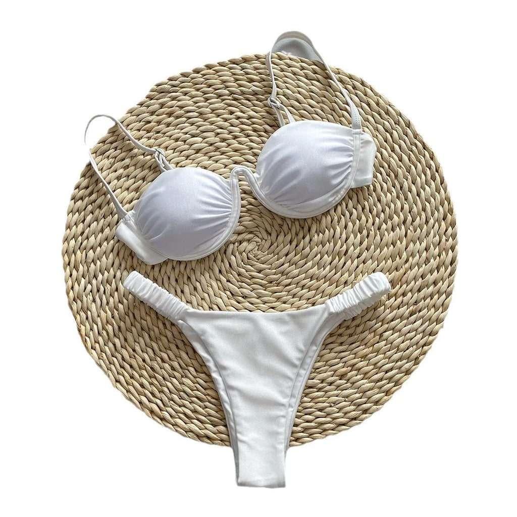 Women's khaki underwire bikini swimsuit with split briefs on a white background.
